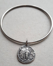 Load image into Gallery viewer, Oxidized sterling silver bangle featuing an ancient Roman coin Felicitas, the goddess of luck and prosperity.
