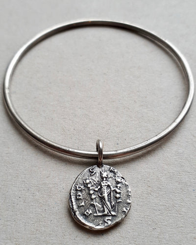 Oxidized sterling silver Immortal bangle featuring an ancient Roman coin Fides, goddess of faith and loyalty.