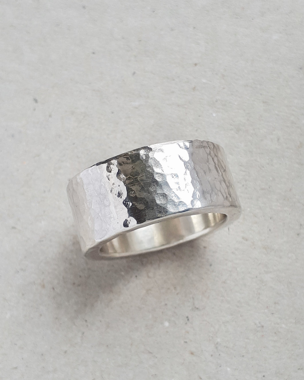 Chunky hammered sterling silver ring. Top view.