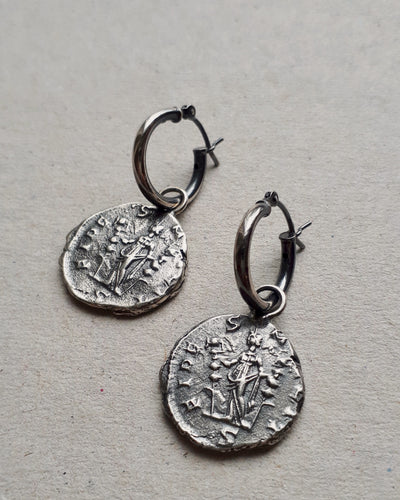 Oxidized sterling silver hoops featuring the ancient Roman coins Fides, goddess of faith and loyalty.
