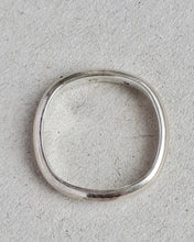 Load image into Gallery viewer, Top view of a soft square sterling silver ring.
